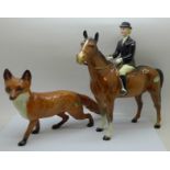 A Beswick model of a horse and rider and a Beswick fox, tail a/f