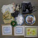 Two pairs of binoculars, one cased, a collection of plates, a table cloth and three framed pictures,