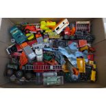 A box of die-cast vehicles including Corgi and Lesney, playworn