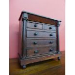 A Victorian stained pine apprentice's/miniature chest of drawers