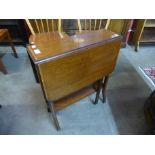 An Edward VII inlaid mahogany Sutherland table