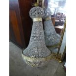 A large French Empire style gilt metal and glass bag shaped chandelier