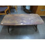 An Ercol elm and beech Windsor coffee table