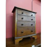 A Victorian oak apprentice's/miniature chest of drawers