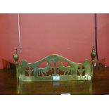 A Victorian solid brass hand made bedroom fire fender, depicting horses