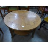 A Nathan teak circular coffee table