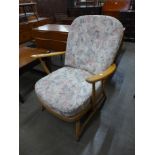 An Ercol Blonde elm and beech Windsor armchair