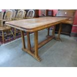 An Arts and Crafts oak refectory table