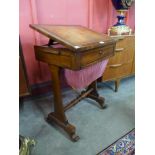 A George IV mahogany and leather topped lady?s sewing/writing table