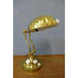 A brass desk lamp