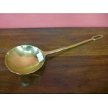 An early 20th Century brass one piece ladle