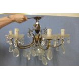 An Italian metal and glass chandelier