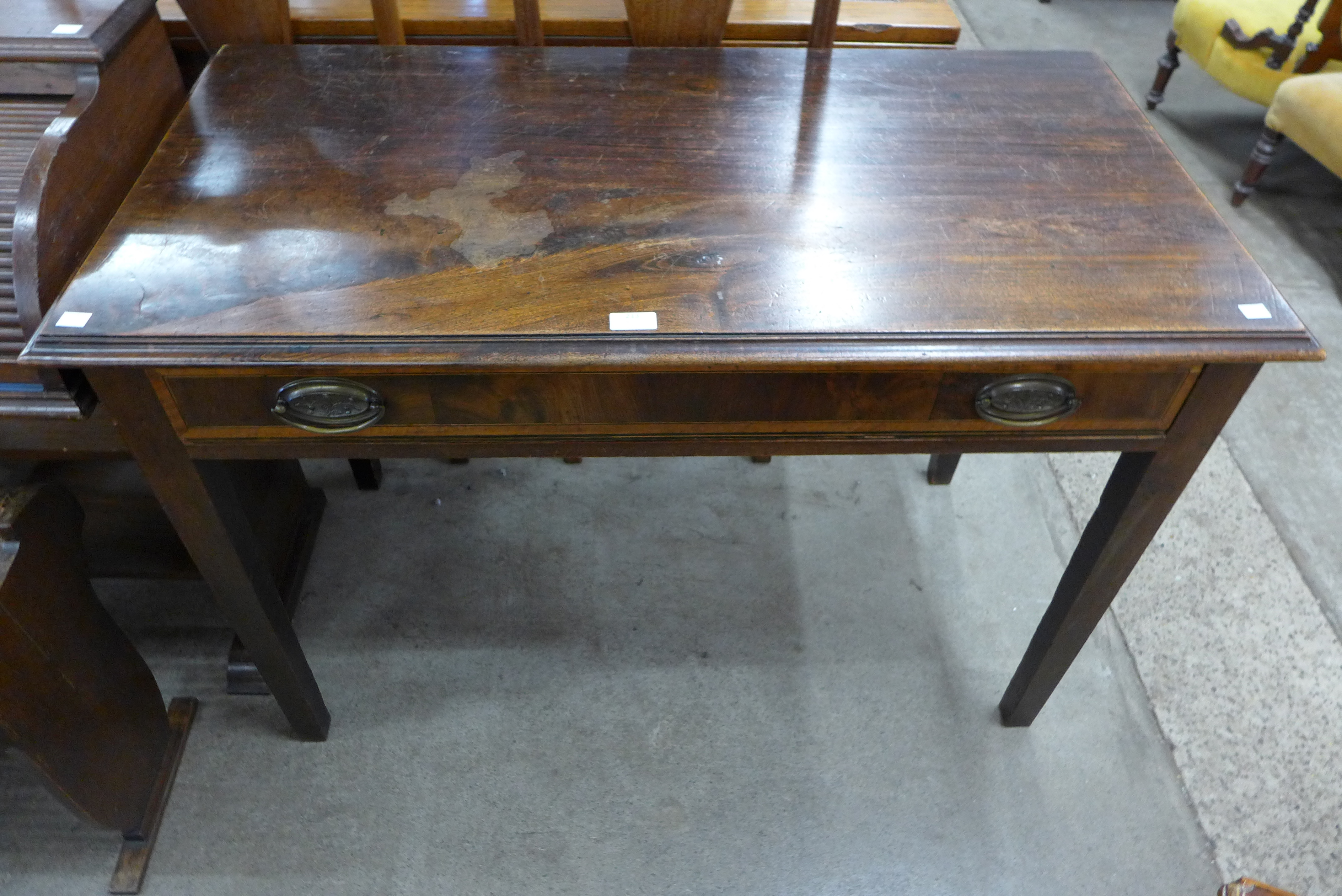 A George III inlaid mahogany single drawer side table