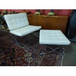 A Barcelona style chrome and white faux leather chair and stool