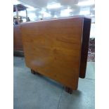 A G-Plan teak drop-leaf table