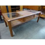 A G-Plan teak and glass topped coffee table