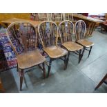 A set of four Victorian elm and ash Windsor kitchen chairs