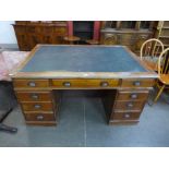 An early 20th Century mahogany partners library desk