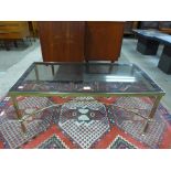 An Italian brass and glass topped rectangular coffee table