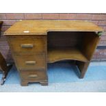 An Art deco oak desk, manner of Heals