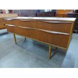 A small teak sideboard