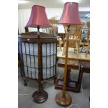 Two oak standard lamps