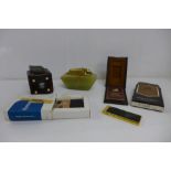 A Ronson onyx table lighter, a dice shaped table lighter and two other table lighters