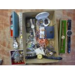 A collection of wristwatches and brooches and a silver ARP badge, etc.