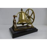 A brass counter top bell