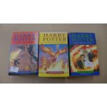 Three Harry Potter first edition books, 4, 5 and 6, 6 with print error on page 99