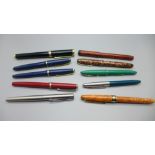 A collection of pens including Conway 150 with 14ct gold nib and one other with 14ct gold nib in