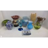 A collection of jugs and vases including a Sylvac vase, a stoneware jug, a Holkham stand, glass