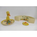 A Clarice Cliff Crocus Bizarre duck stand, a/f, a Wilkinson planter and an unmarked lid