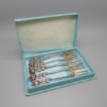 A set of six Art Nouveau continental silver forks, 104g, marked 800
