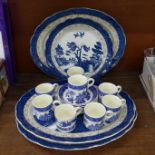 A set of three oval Booths Real Old Willow pattern meat dishes, a plate circa 1912, a set of five