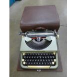 A vintage Imperial typewriter **PLEASE NOTE THIS LOT IS NOT ELIGIBLE FOR POSTING AND PACKING**