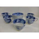 Five Wedgwood cups with European coastal scenes plates and six Wedgwood saucers with Vesuvius scenes