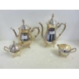 A four piece plated tea service, tea pot lid loose **PLEASE NOTE THIS LOT IS NOT ELIGIBLE FOR