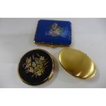 A Stratton compact, a House of Commons compact and an enamelled cigarette case