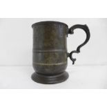 A circa 1800 pewter tankard, marked Imperial 1/2 Pint, with many measures stamps, VR, WIV