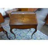 A 19th Century French marquetry inlaid rosewood and gilt metal mounted bureau de dame