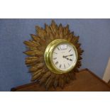 A Baskerville sunburst wall clock, a/f