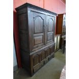 A George III oak housekeeper's cupboard