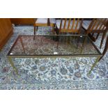 An Italian brass and glass topped rectangular coffee table