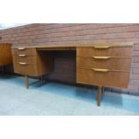 An Austin Suite teak desk