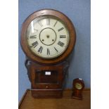 A 19th Century American inlaid walnut wall clock and a small Edward VII mahogany mantel timepiece,