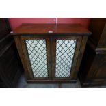 A Regency mahogany two door side cabinet