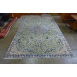 A Persian hand knotted wool mint green ground Isfahan rug