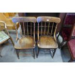 A pair of elm kitchen chairs