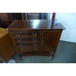 An Edward VII mahogany and satinwood inlaid music cabinet